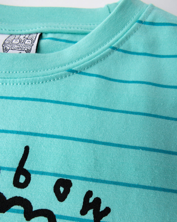 Close up detail of the Happy Rainbow Tee in teal stripe