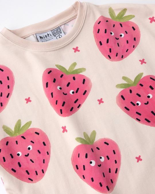 Close up of the Happy Strawberry Tee print in cream