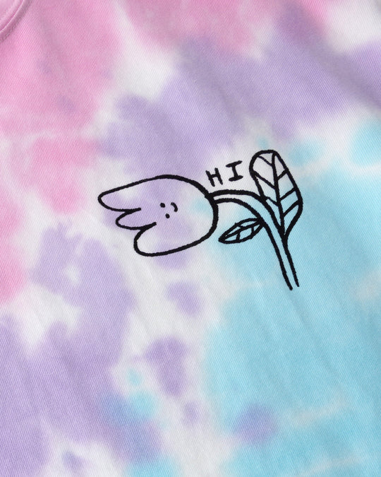Close up of the Pocket Flower Tee print in tie dye