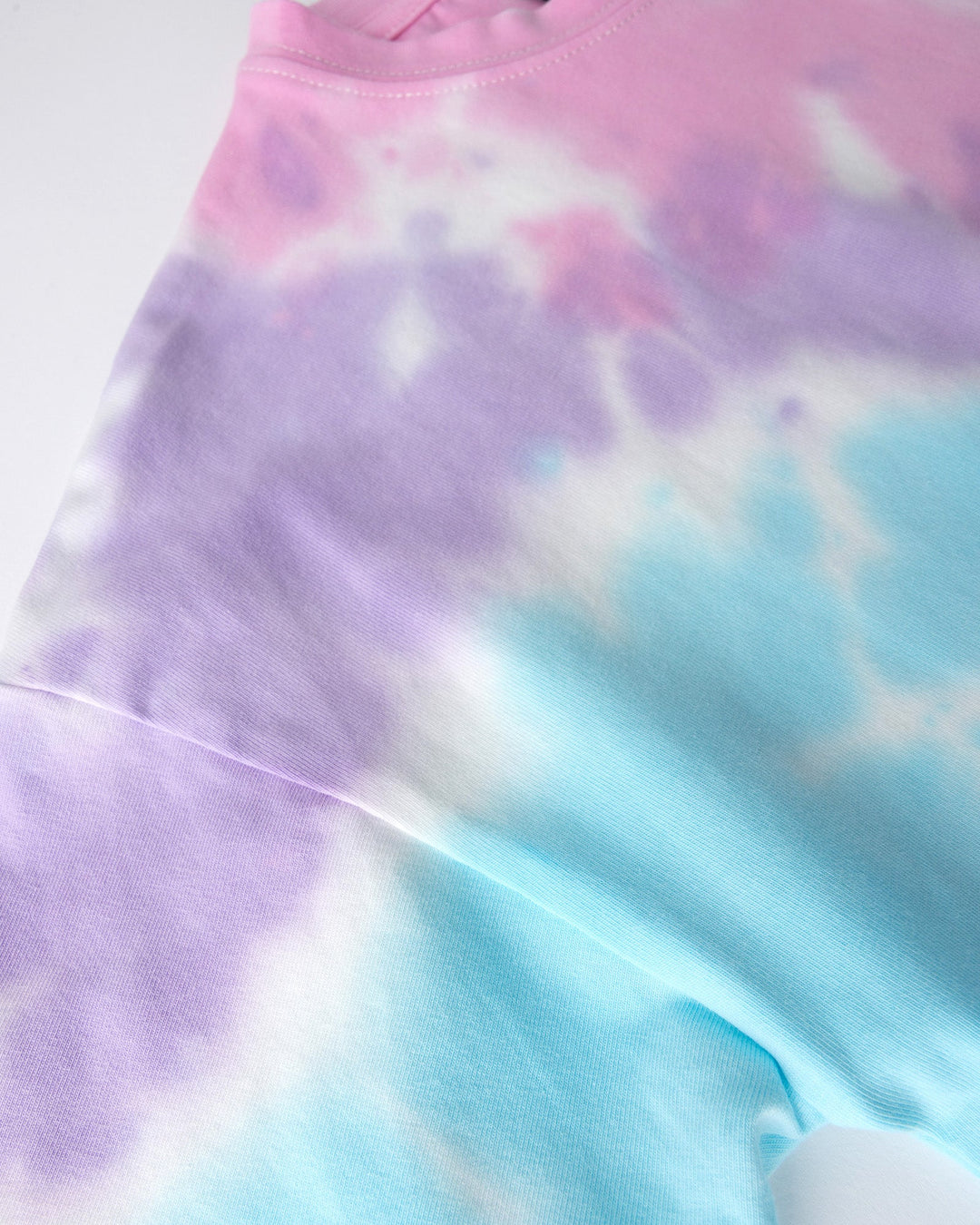 Close up detail of the Pocket Flower Tee in tie dye