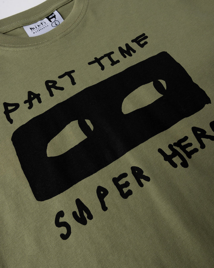 Close up of the Part Time Super Hero Tee print in light khaki