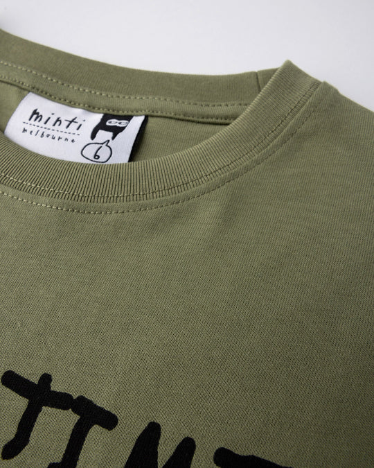 Close up detail of the Part Time Super Hero Tee in light khaki