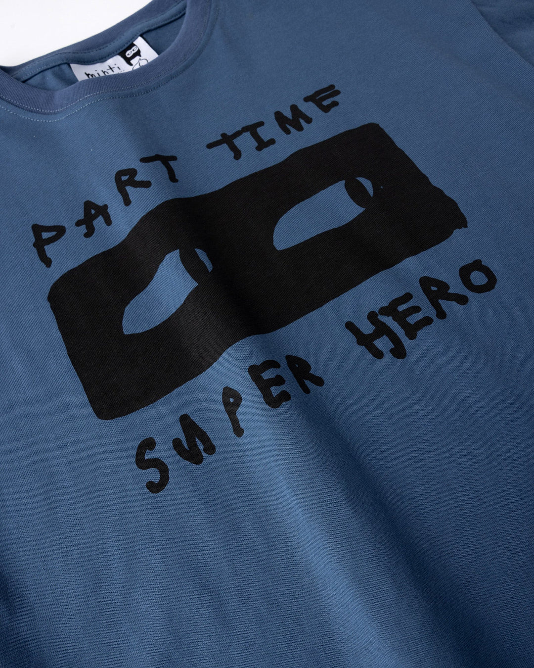 Close up of the Part Time Super Hero Tee print in midnight