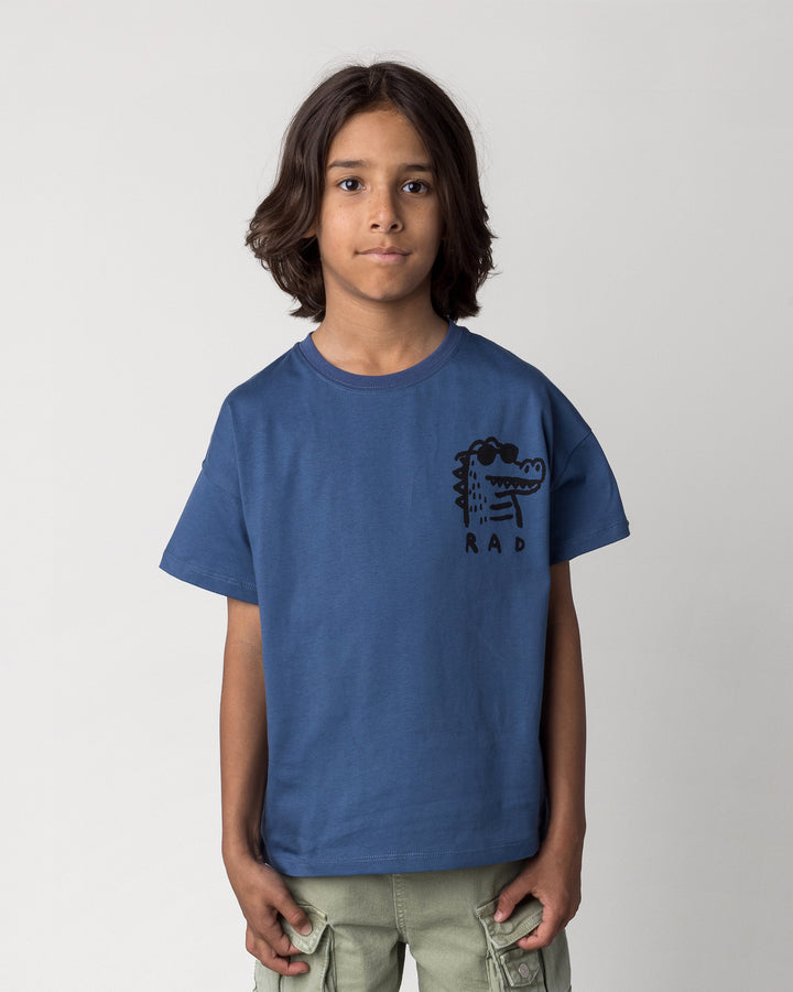 Close up of the Rad Croc Tee in blue on a kid, front view