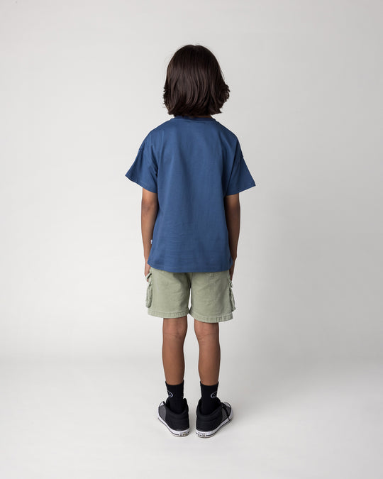 Kid wearing the Rad Croc Tee in blue, back view