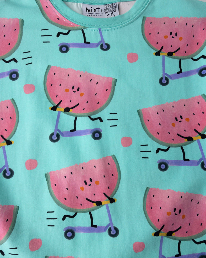 Close up detail of the Scooting Watermelon Tee in light mint