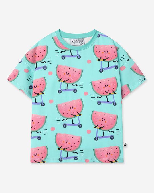 Scooting Watermelon Tee in light mint, girls t shirt by Minti, flat lay