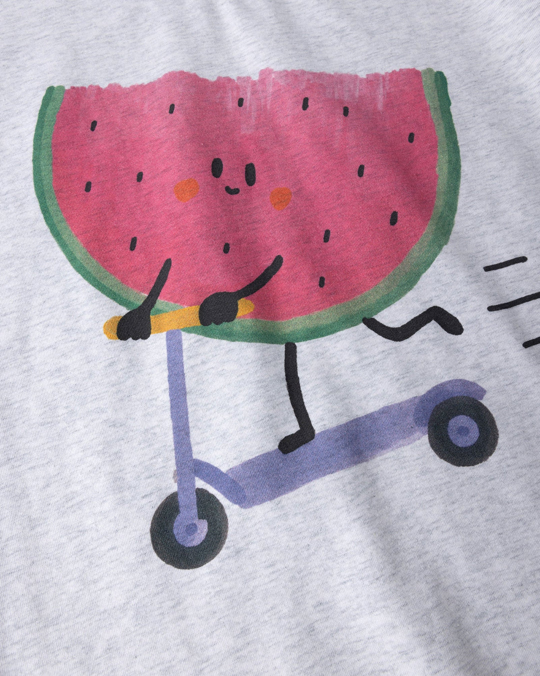 Close up of the Scooting Watermelon Tee print in white marle, candy and green