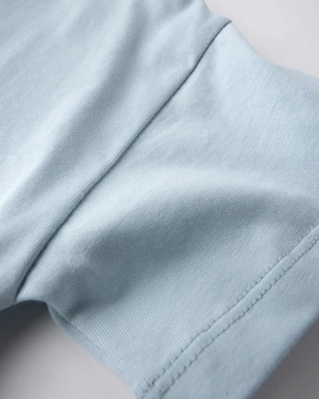 Close up detail of the Skate Cactus Tee in light blue