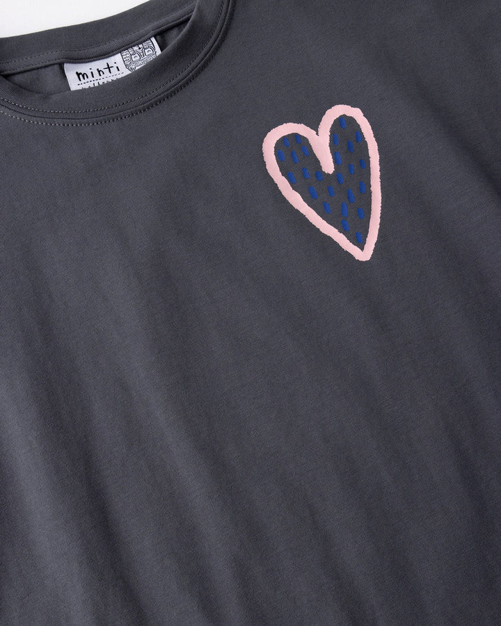Close up of the Speckle Heart Tee print in dark grey
