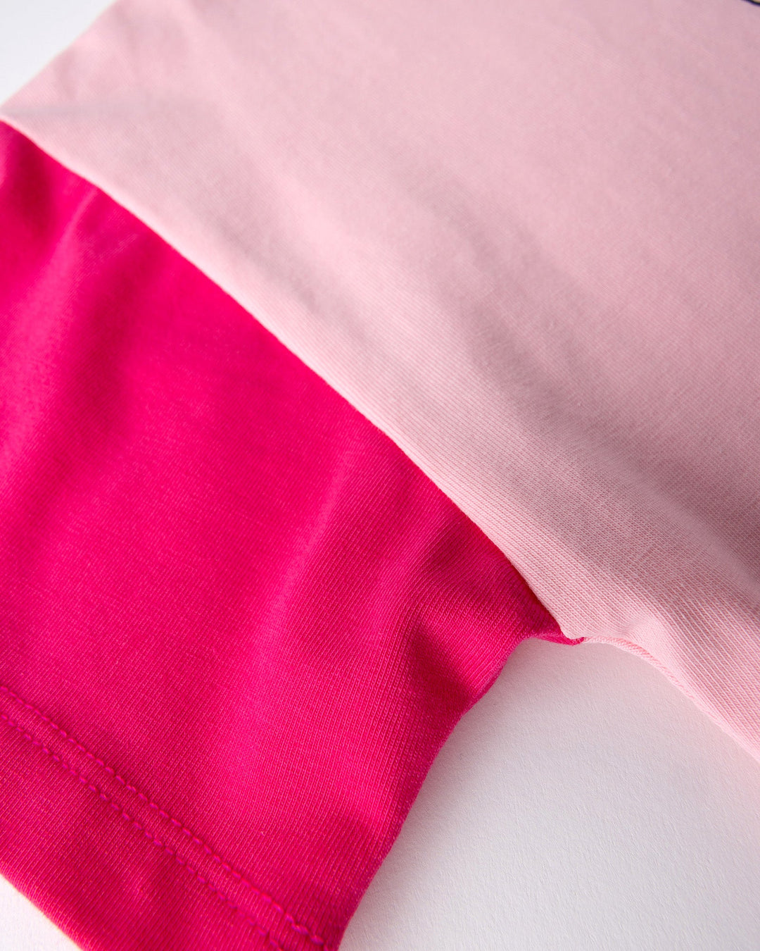 Close up detail of the Unicorn Club Tee in pink, hot pink and aqua
