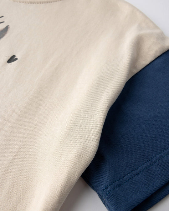 Close up detail of the Watercolour Unicorn Tee in stone and midnight