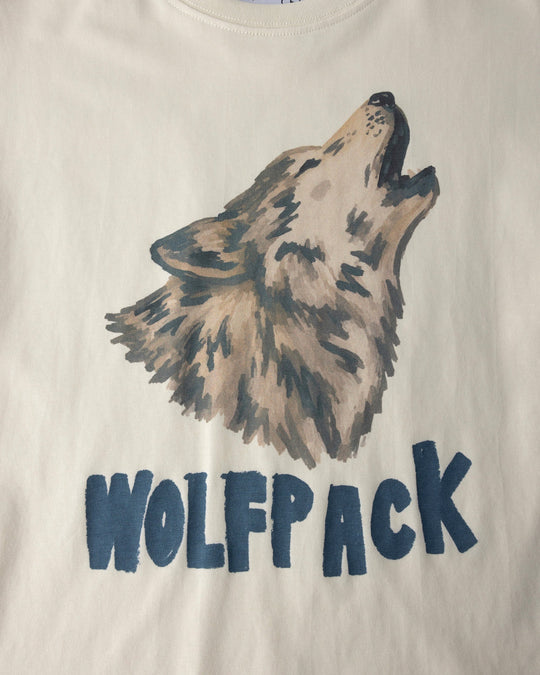 Close up of the Wolfpack Tee print in cream
