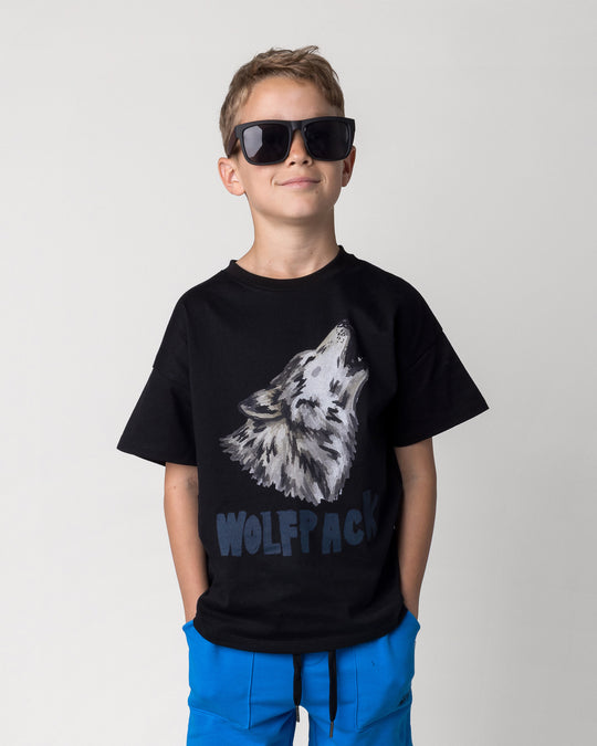 Close up of the Wolfpack Tee in black on a kid, front view