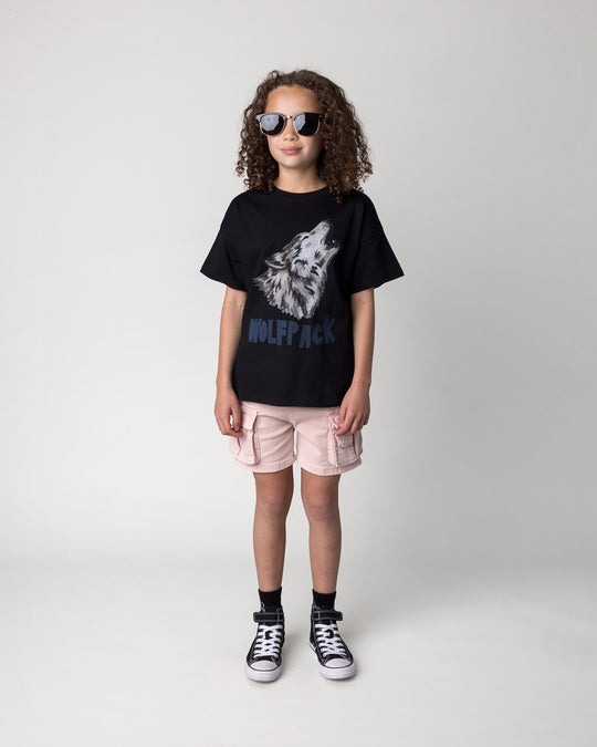 Kid wearing the Wolfpack Tee in black, front view