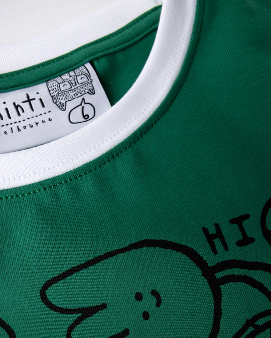 Close up detail of the Flower Party Tee in kelly green and white