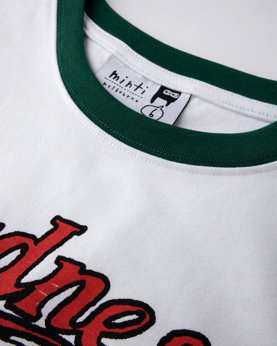 Close up detail of the Radness Tee in white and jungle