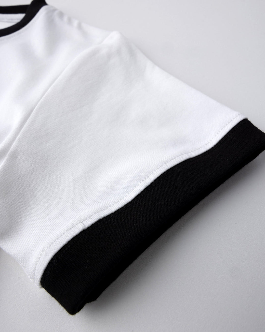 Close up detail of the Skate Ghost Tee in white and black