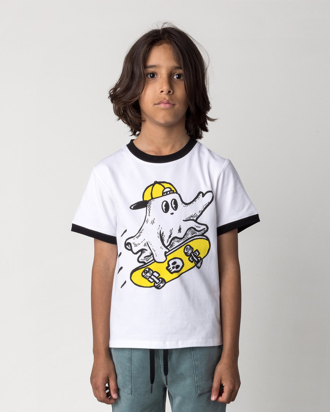 Close up of the Skate Ghost Tee in white and black on a kid, front view