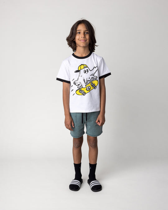 Kid wearing the Skate Ghost Tee in white and black with the Blasted Track Short in forest wash, front view