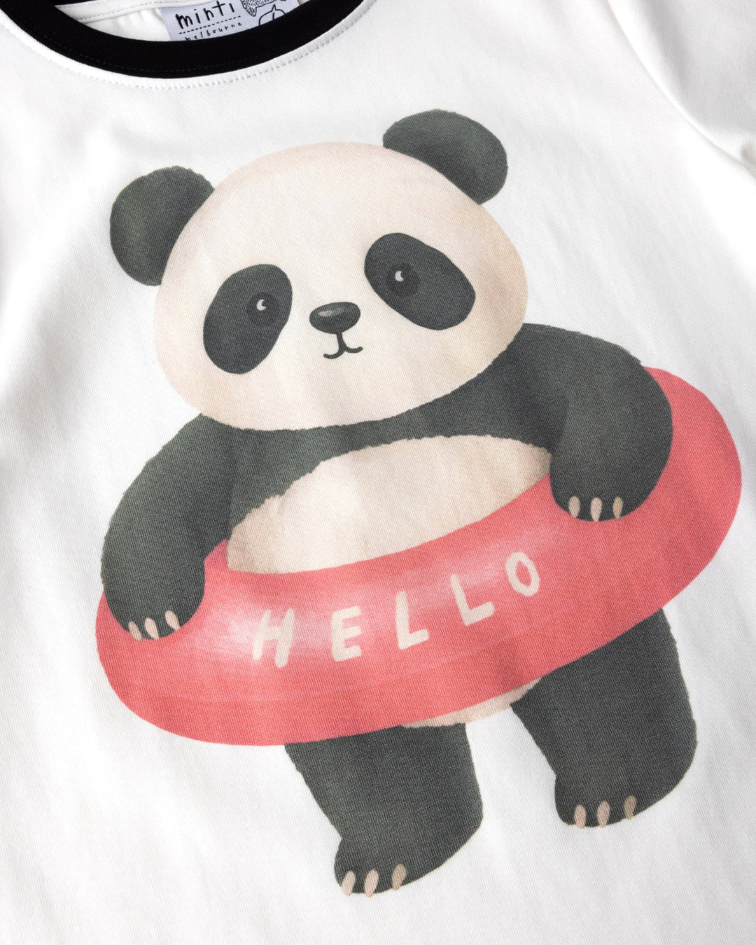 Close up of the Swimming Panda Tee print in white and black