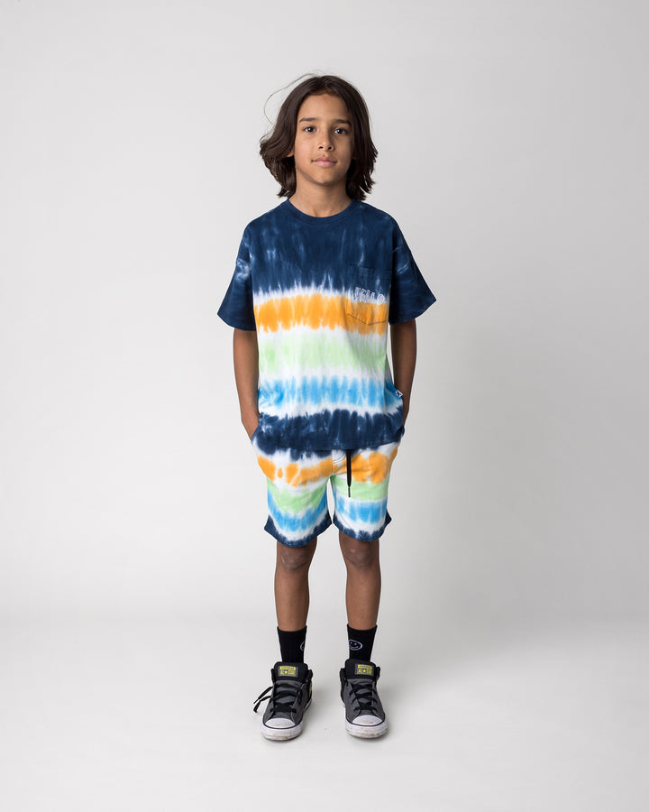 Kid wearing the Airwaves Tee in navy with the Airwaves Short in navy, front view
