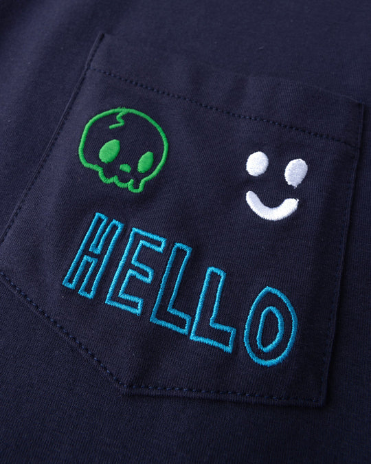 Close up detail of the Badges Tee in ink