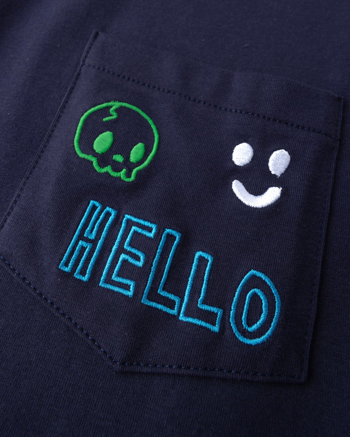 Close up detail of the Badges Tee in ink