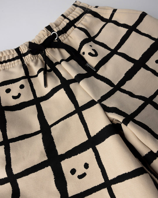 Close up of the Happy Squares Short print in beige