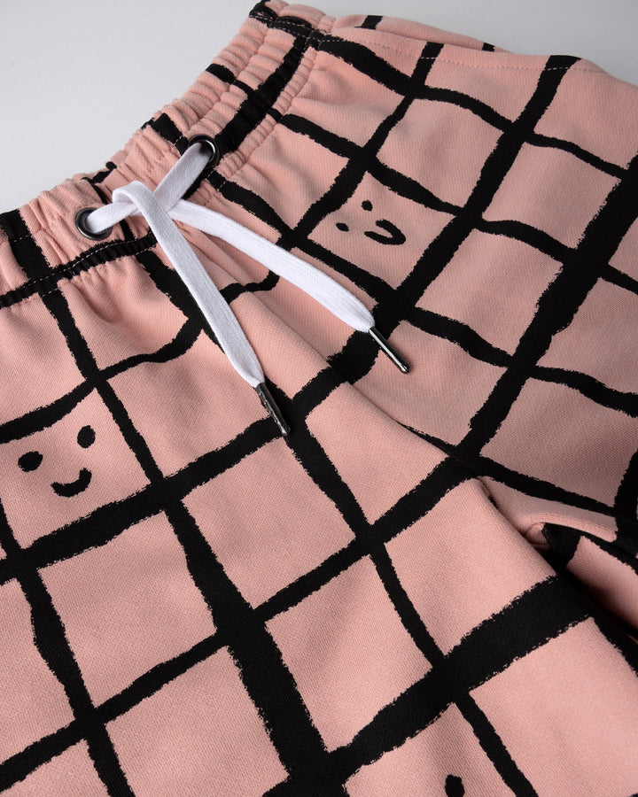 Close up of the Happy Squares Short print in dusty pink