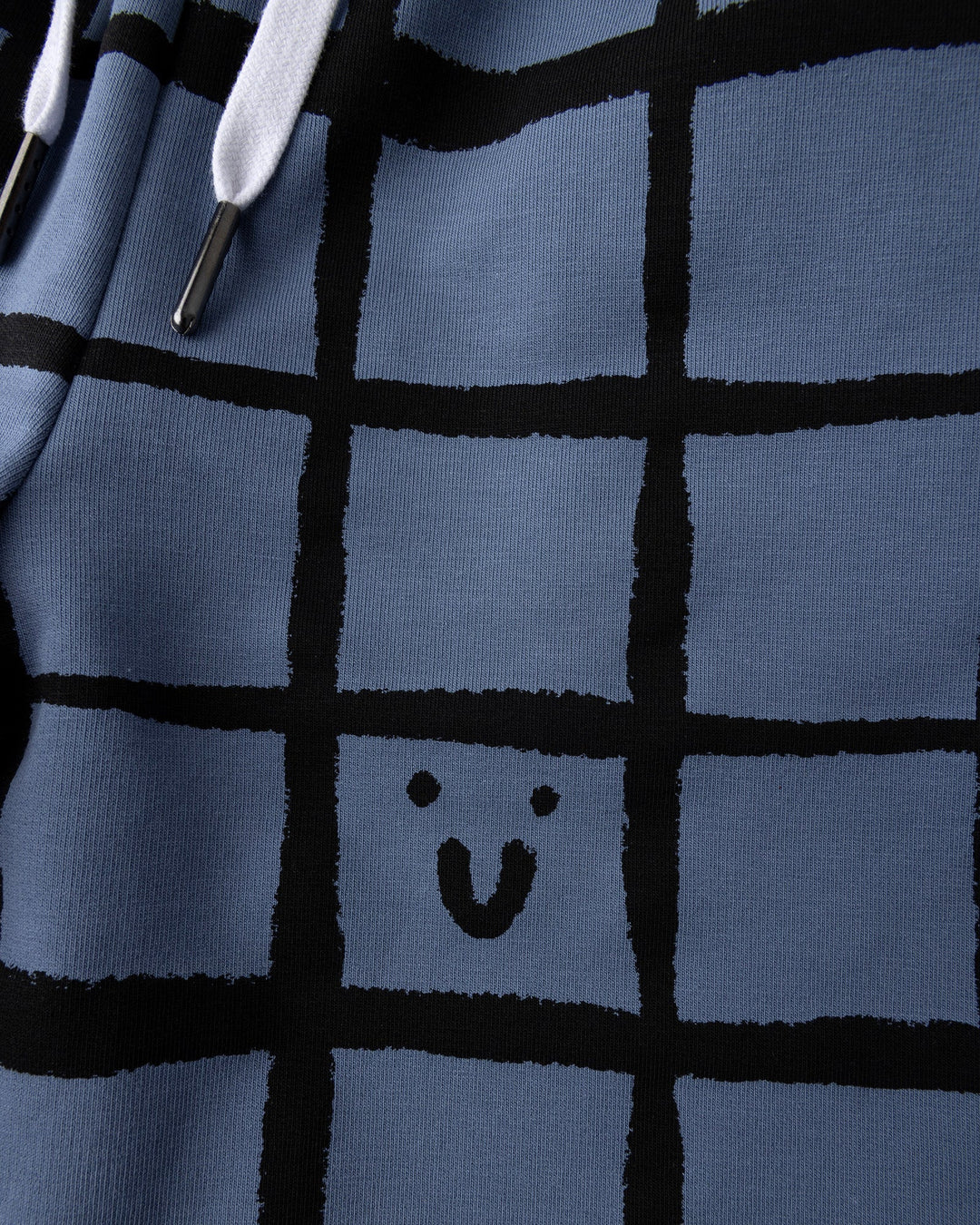 Close up of the Happy Squares Short print in muted blue