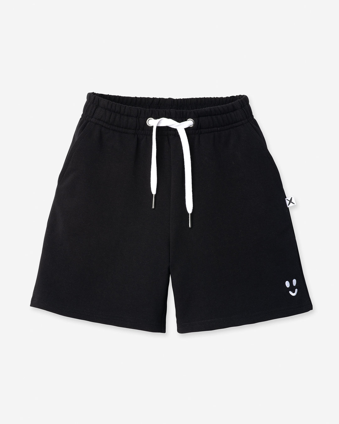 Smile Short in black, kids shorts by Minti, flat lay