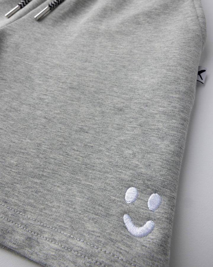 Close up detail of the Smile Short in grey marle