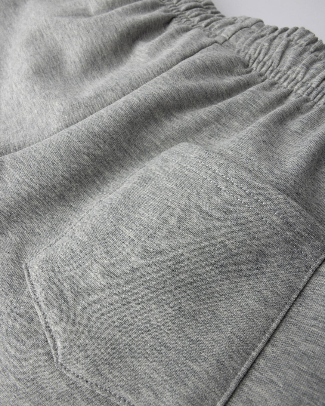 Close up detail of the Smile Short in grey marle