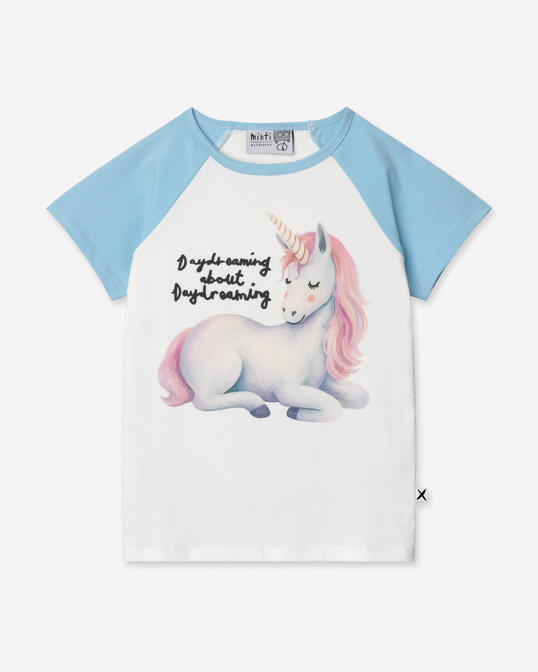 Daydreaming Unicorn Tee in white and light blue, girls t shirt by Minti, flat lay