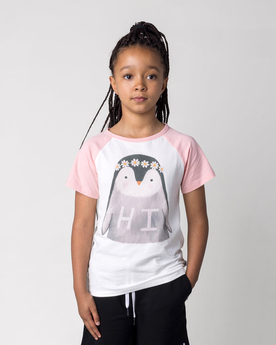 Close up of the Flower Penguin Tee in white and pink on a kid, front view