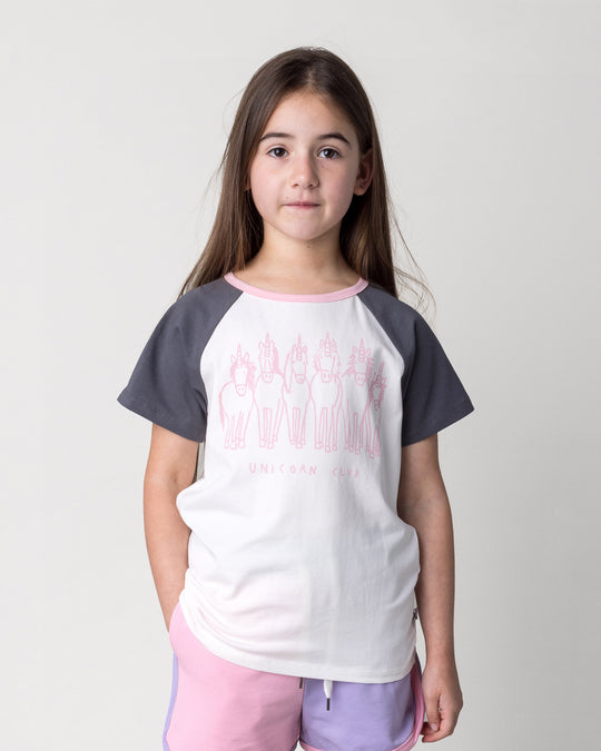 Close up of the Unicorn Club Tee in white and dark grey on a kid, front view