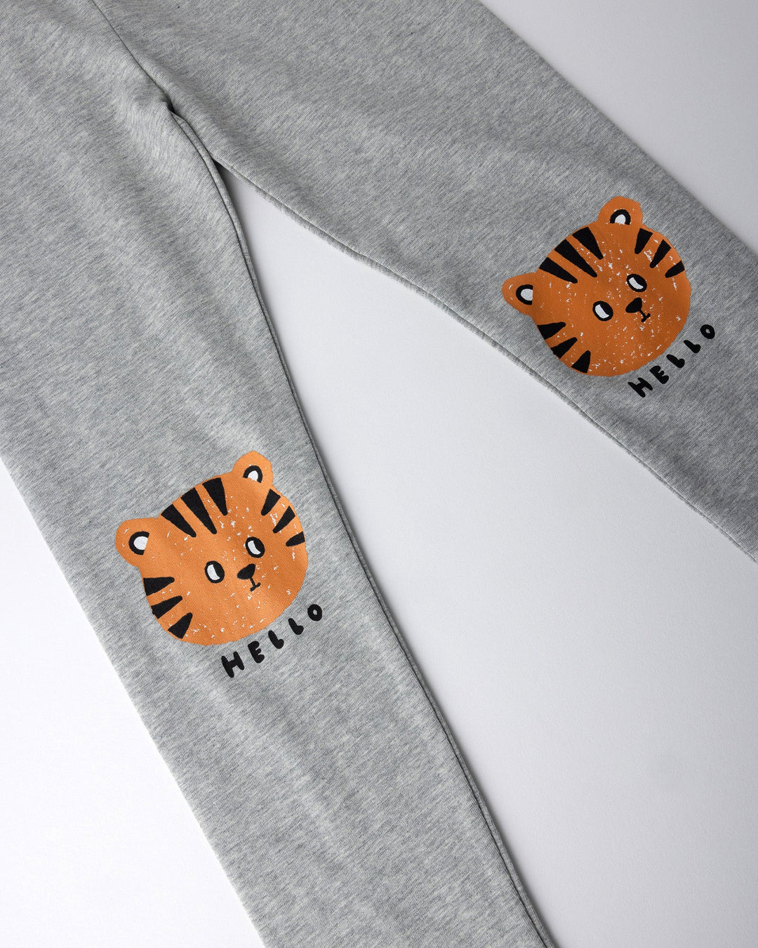 Close up of the Hello Tiger Tights print in grey marle