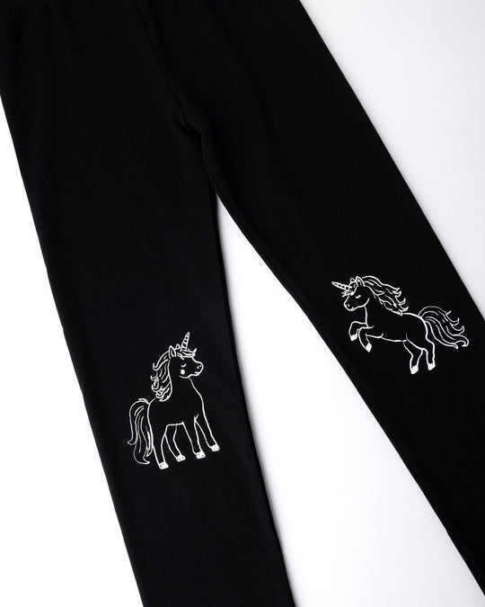 Close up of the Hello Unicorn Tights print in black