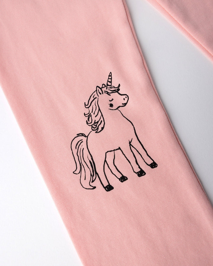Close up of the Hello Unicorn Tights print in pink