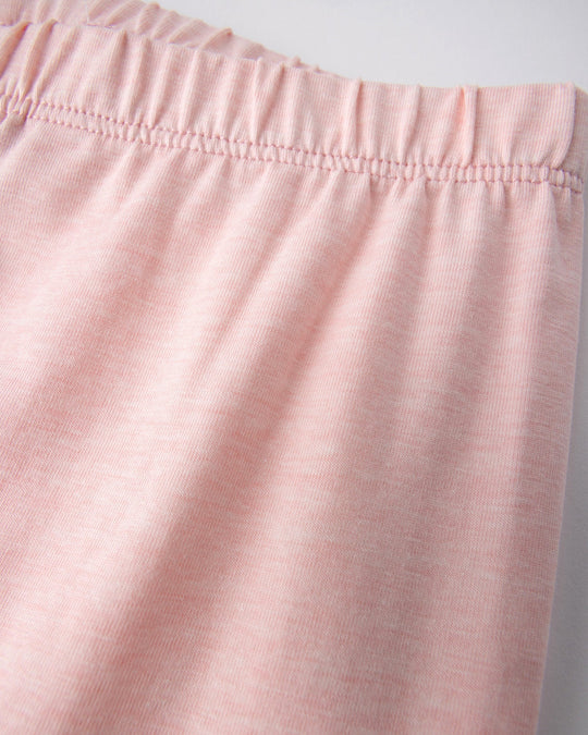 Close up detail of the Happy Strawberry Tights in pink marle