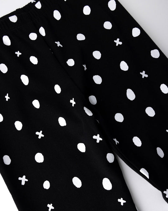Close up of the Spotty Tights print in black