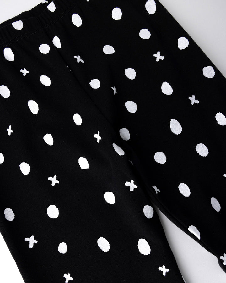 Close up of the Spotty Tights print in black