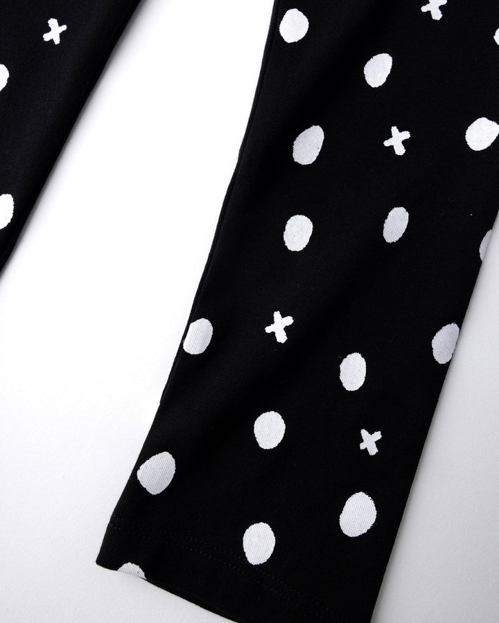 Close up of the Spotty Tights print in black