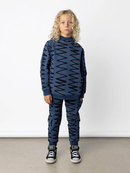 Minti kids clothing. Super comfy hoodie with side pockets and higher neck - perfect for cold days! 330 Gram // Brushed Inside // 95% Cotton // 5% Elastane.
