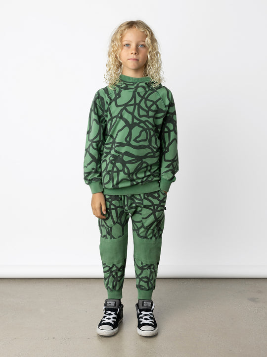 Minti kids clothing. Super comfy hoodie with side pockets and higher neck - perfect for cold days! 260 Gram // 95% Cotton // 5% Elastane.