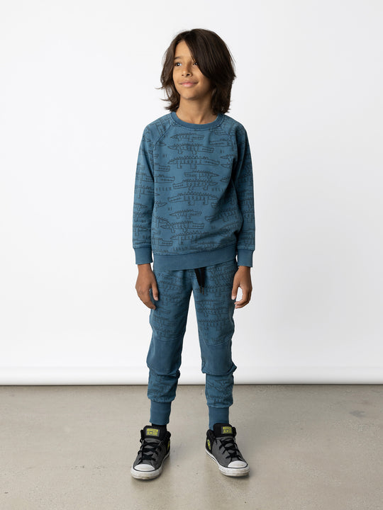 Minti kids clothing. Comfy lightweight raglan crew in super cool washed terry. 260 Gram // 95% Cotton // 5% Elastane.