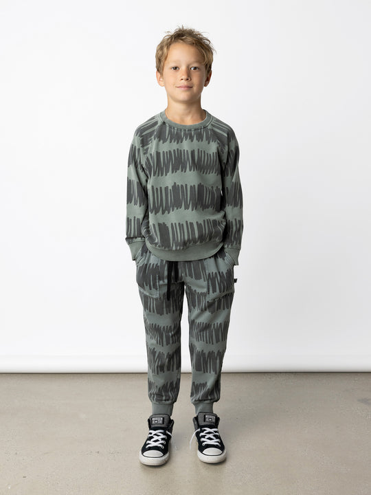 Minti kids clothing. Comfy lightweight raglan crew in super cool washed terry. 260 Gram // 95% Cotton // 5% Elastane.