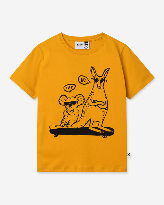 Chill Mates Tee in mustard, boys t shirt by Minti, flat lay