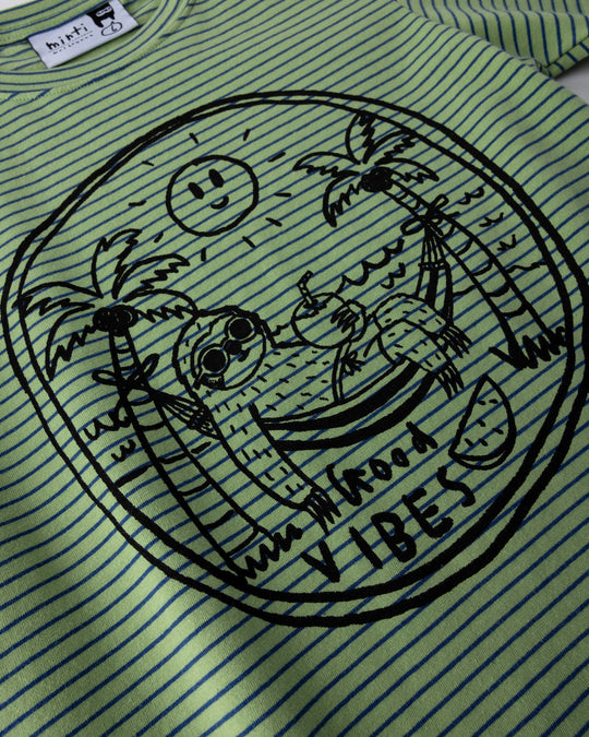 Close up of the Chill Sloth Tee print in lime stripe